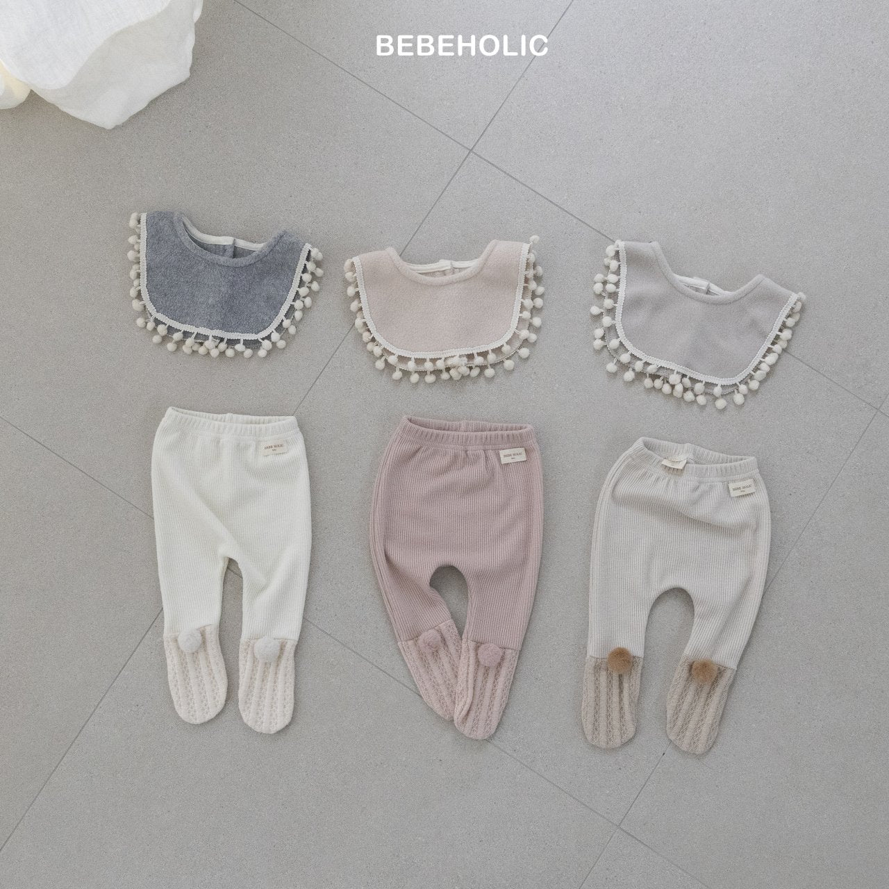 bebeholic pom pom tape bib