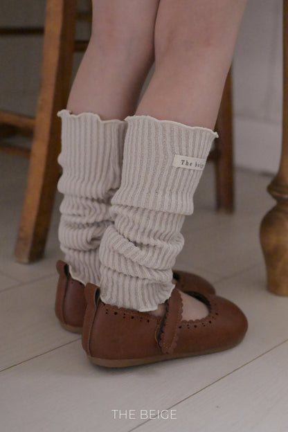 the beige knit warmer