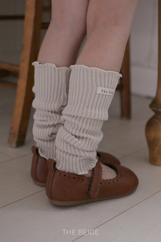 the beige knit warmer
