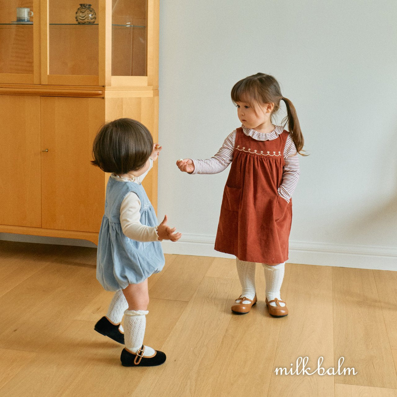 milkbalm baliey suit (3-18m)