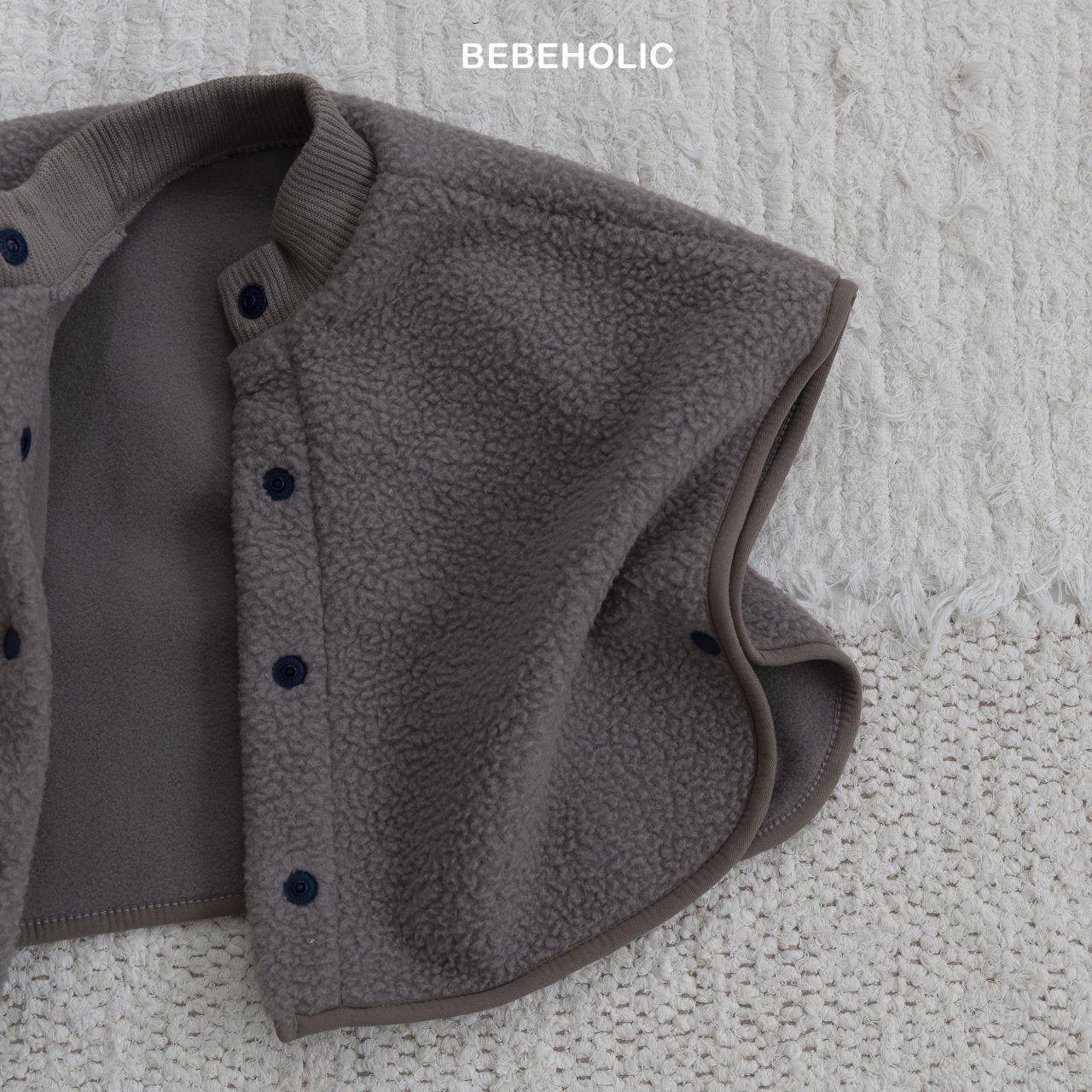 bebeholic puffy dumbbell poncho