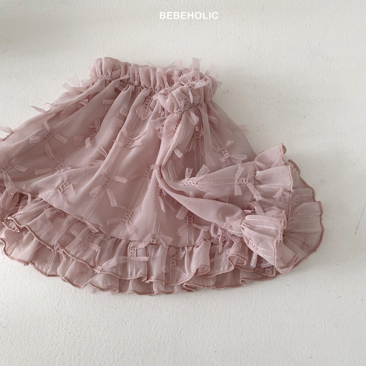 bebeholic roman ribbon skirt (Bebe)