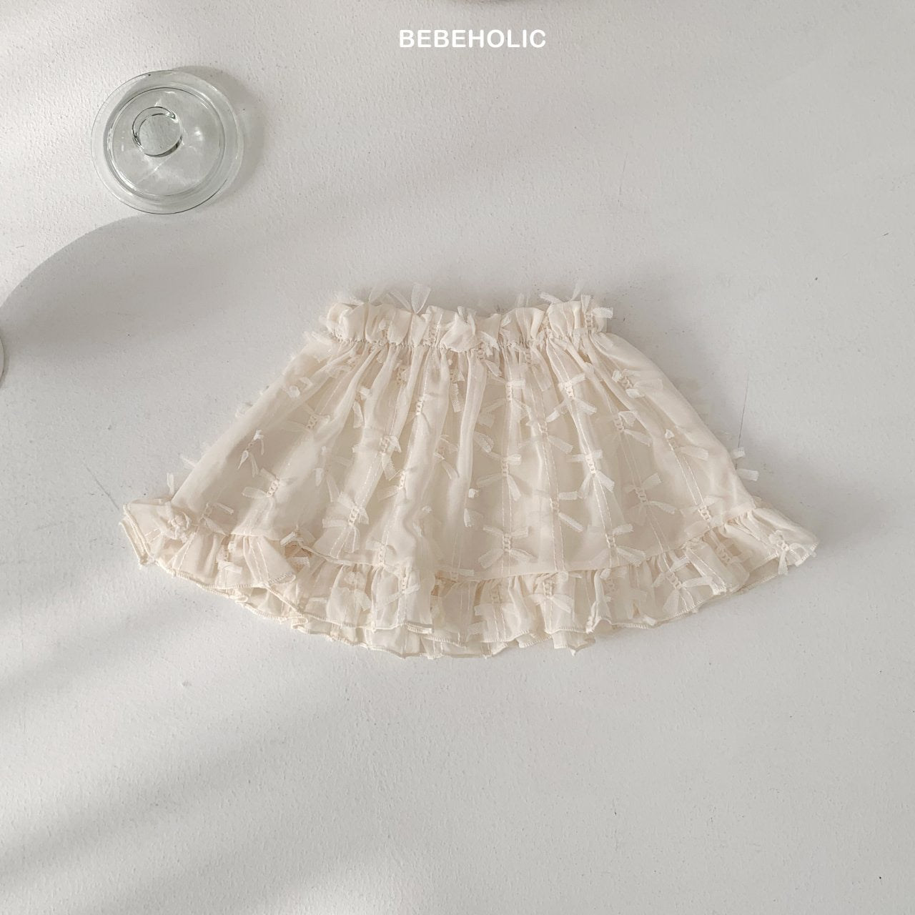 bebeholic roman ribbon skirt (Bebe)